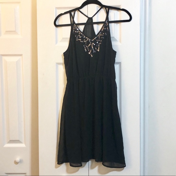 Cute black dress with silver sequins! - Picture 1 of 4